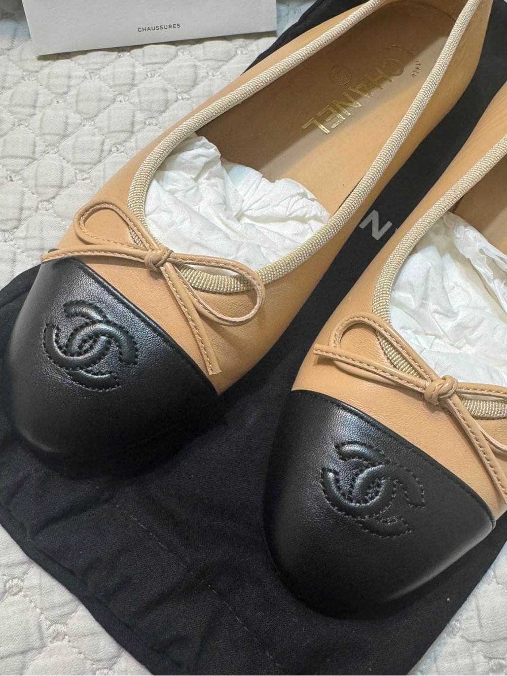 CHANEL Two-Tone Beige and Black Leather Cap-Toe Ballet Flats - Picture 2 of 8